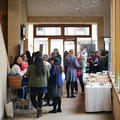 Conference attendees networking during a break